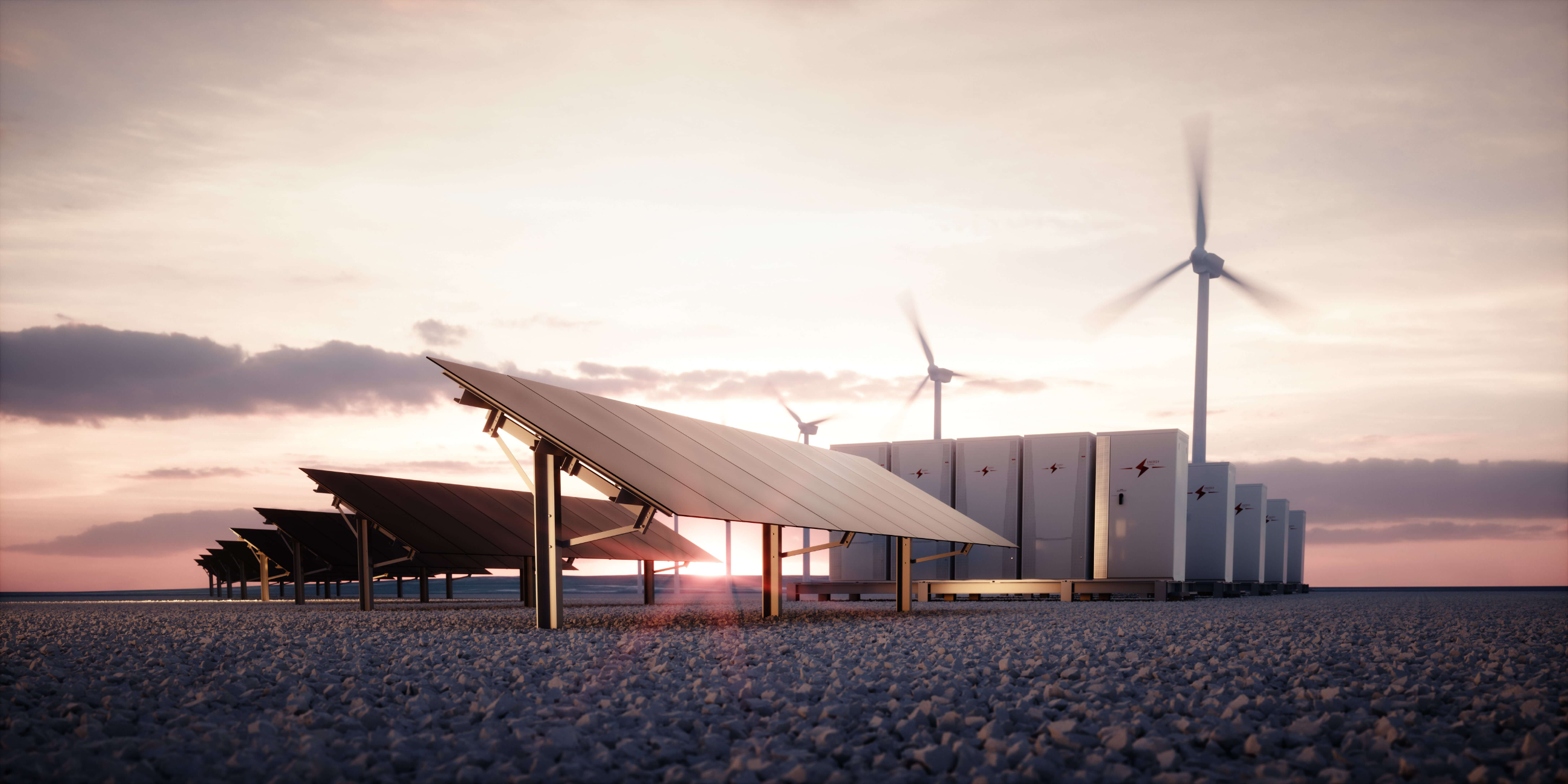 Solar arrays and grid-scale battery storage containers at a utility site at sunset